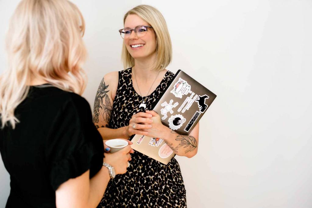 Sarah talking to client